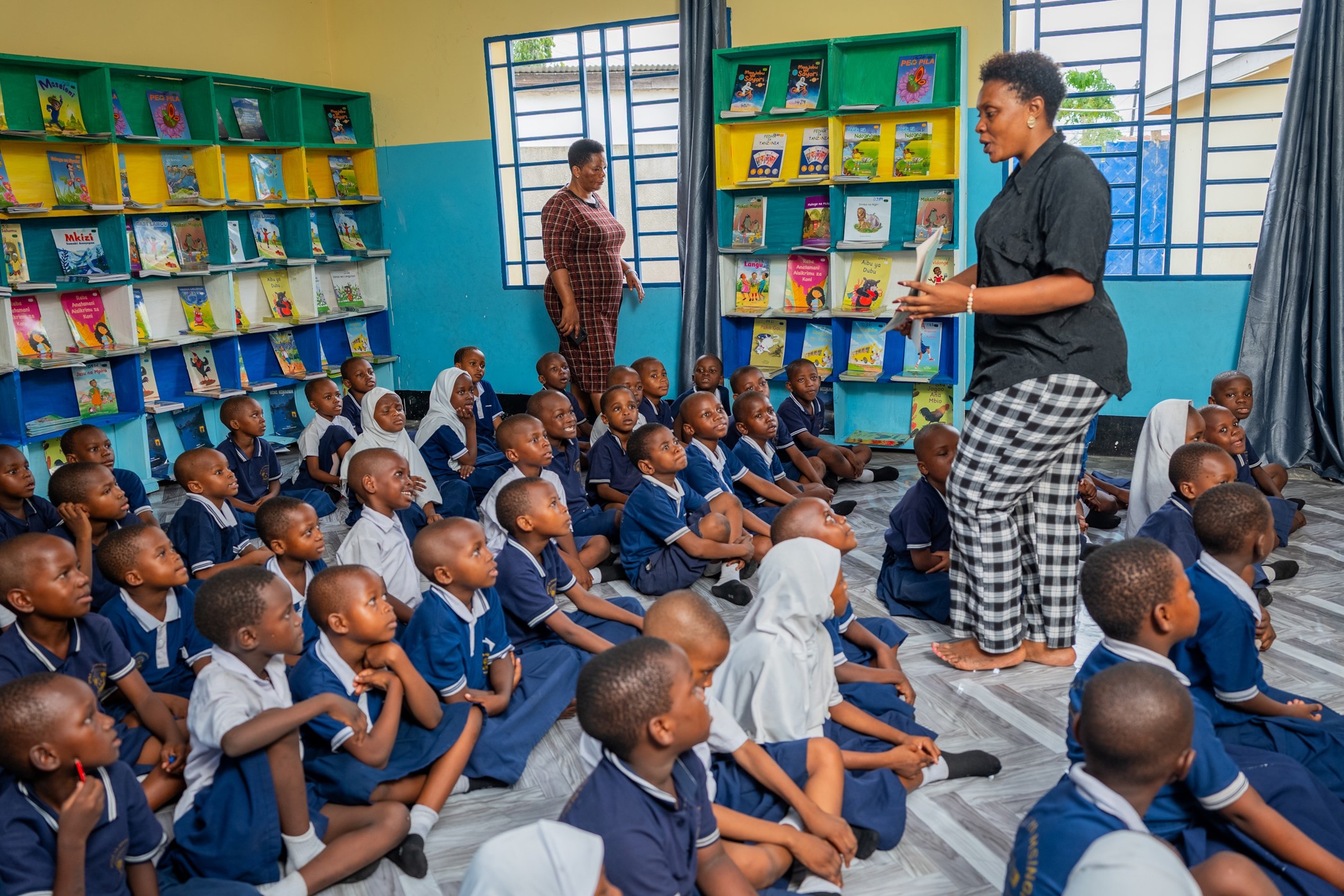 Barriers to equity in education, a classroom full of students participating in a lesson