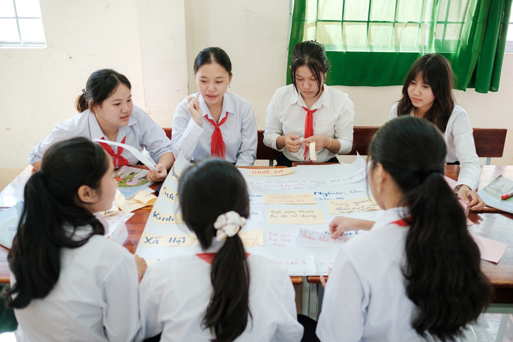 Girls learning together in a classroom