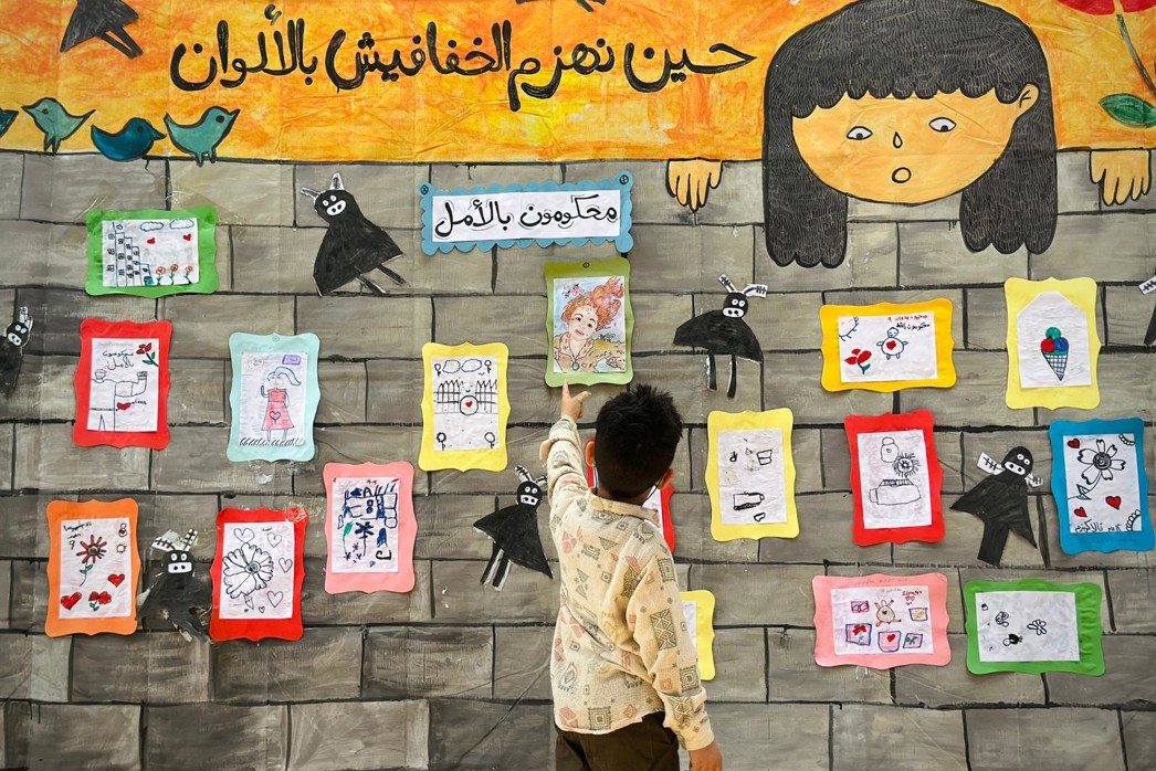 What is equity in education, a boy student drawing during a classroom learning activity