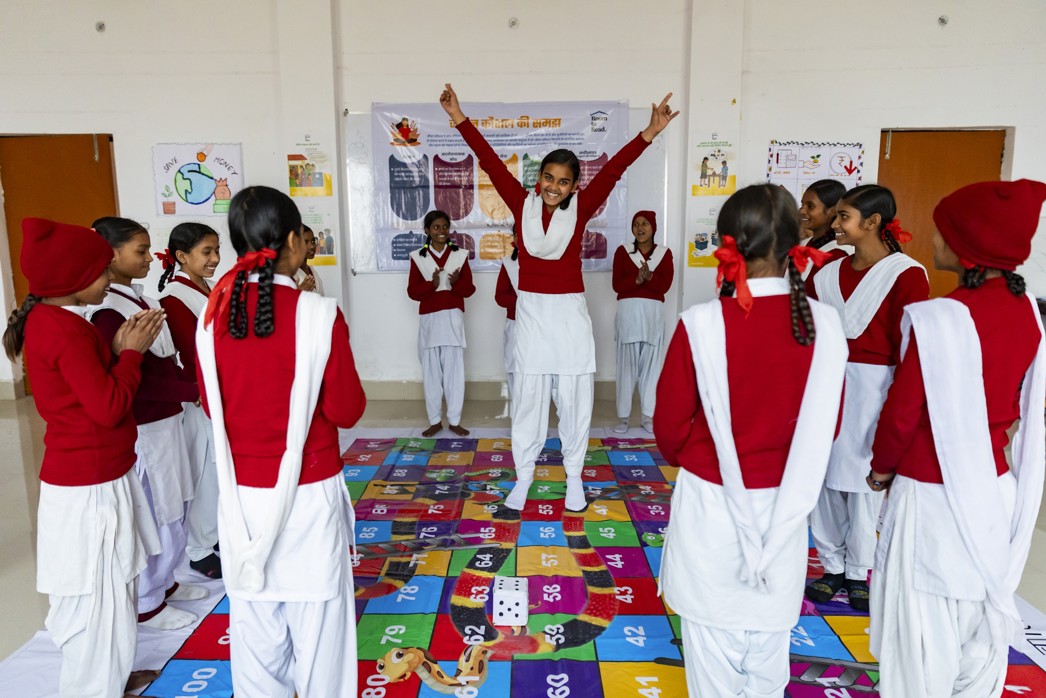 Empowering girls, girls learning and participating in a Room to Read classroom
