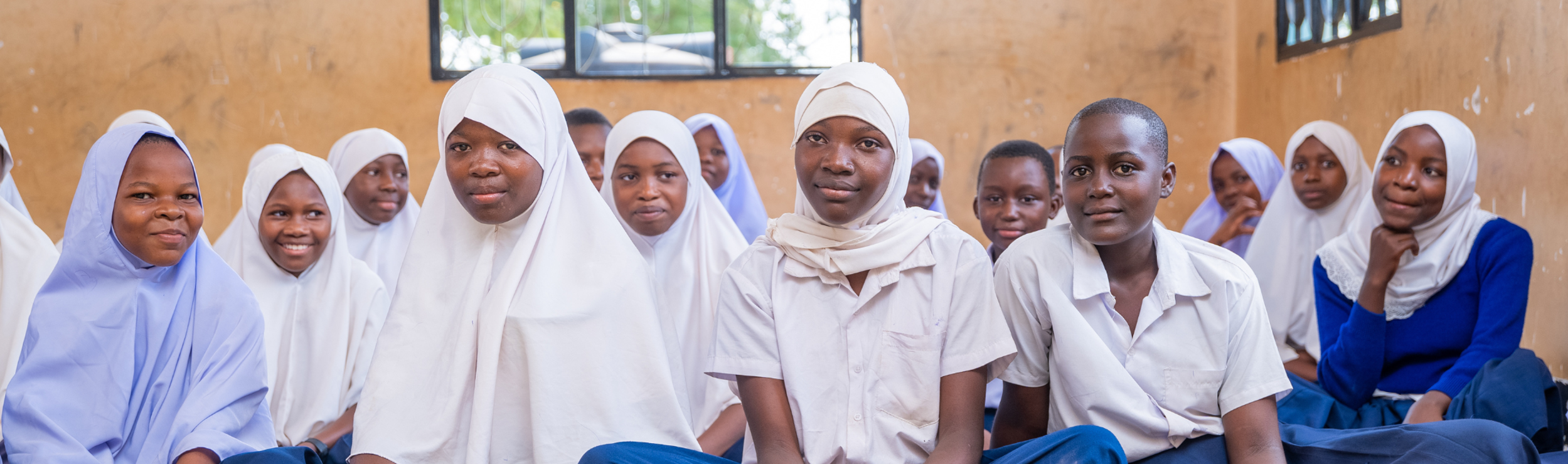 Girls education in Africa girls seated in a Room to Read classroom in Tanzania