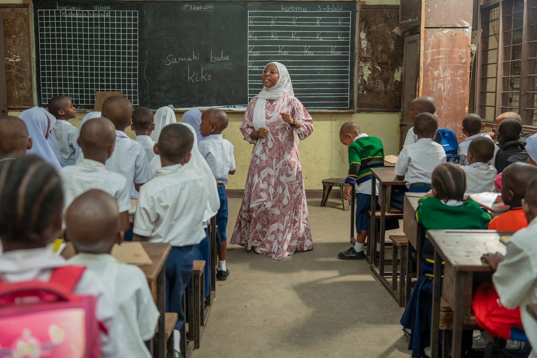 Barriers to equity in education, a teacher using the native language to teach a lesson