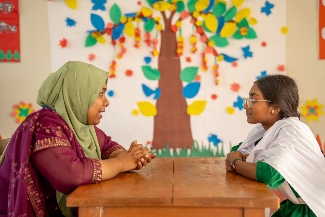 A mentor giving advice to a student