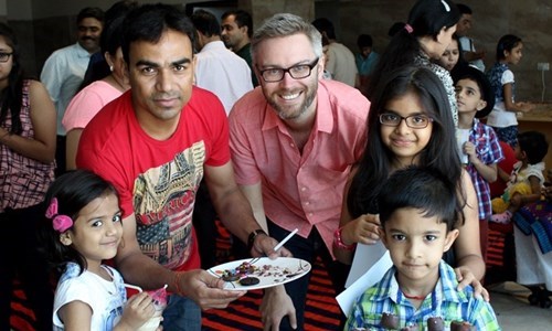 Ryan H. and our India country team at a family fun event in Delhi, India