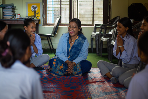 Gender Equality Program mentor with students