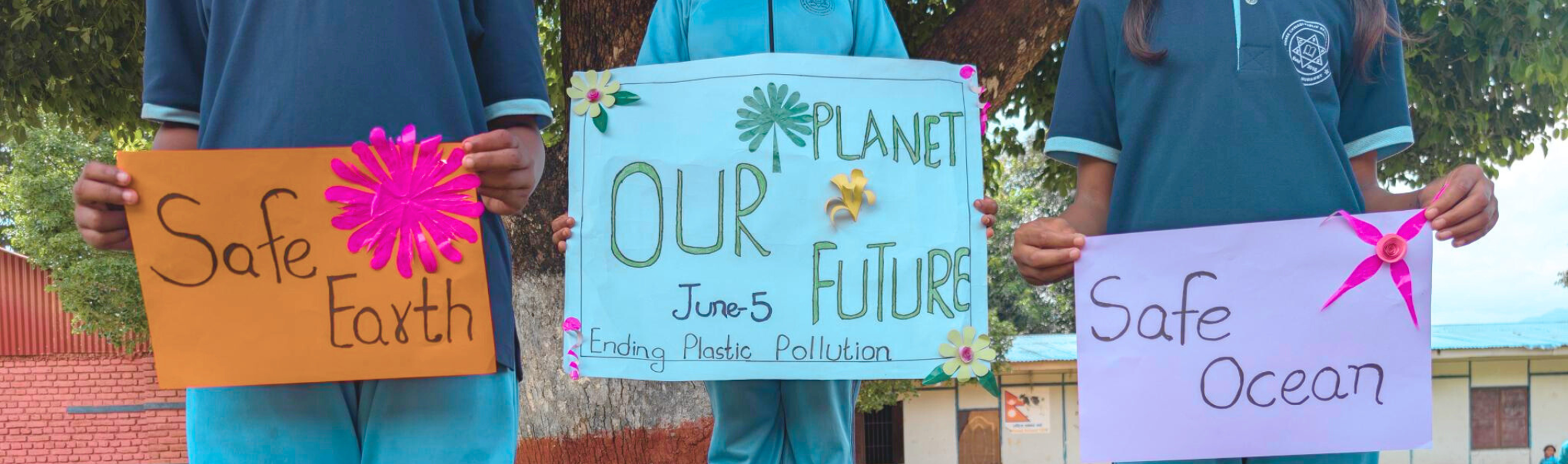 Climate change and gender equality, climate action signs made by girls in Nepal