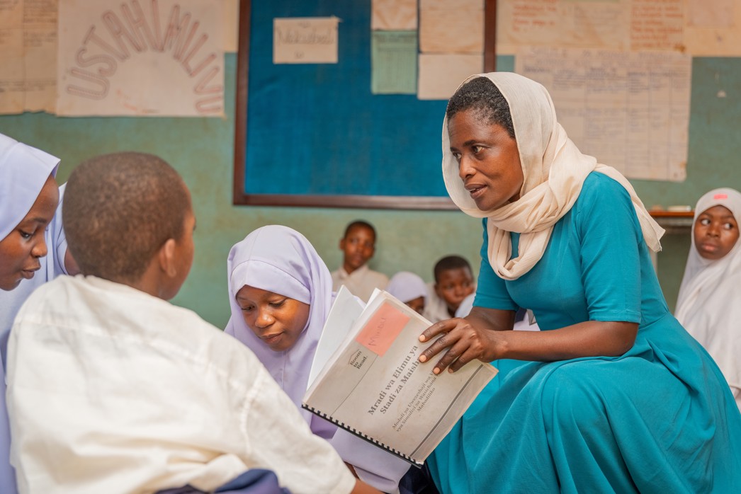 How to achieve equity in education, a teacher making an assessment to guide the program