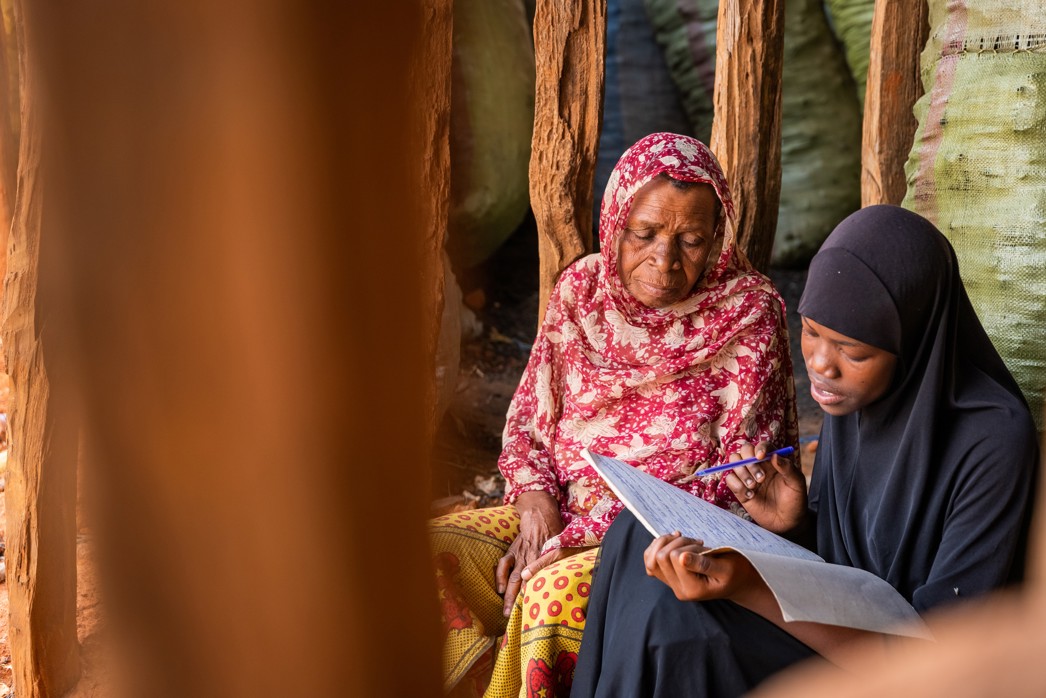 How to achieve equity in education, a student learning alongside a parent at home