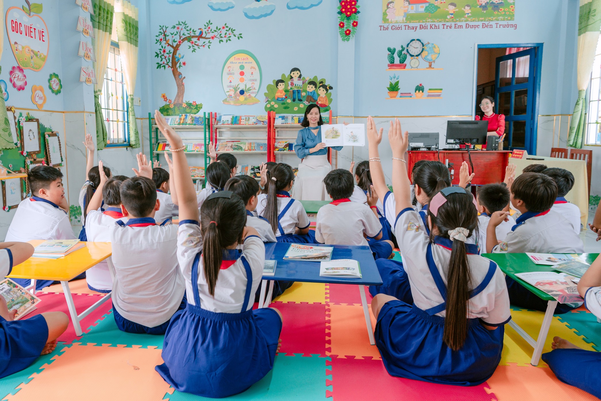 How to achieve equity in education, a teacher leading a lesson in front of the class