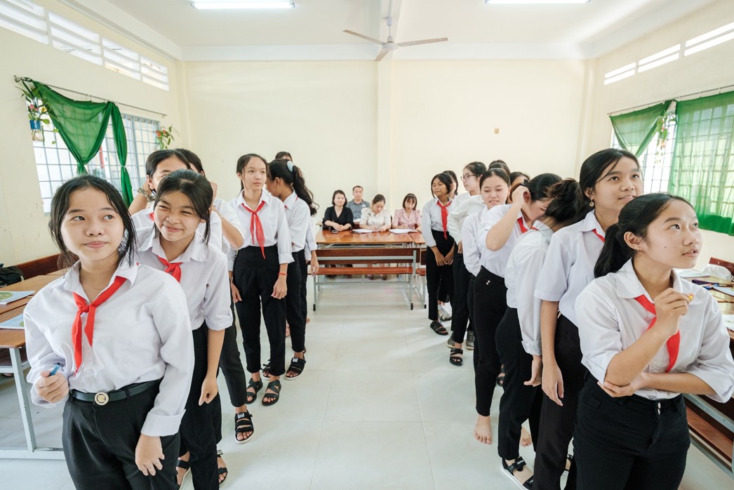Girls sitting together in class