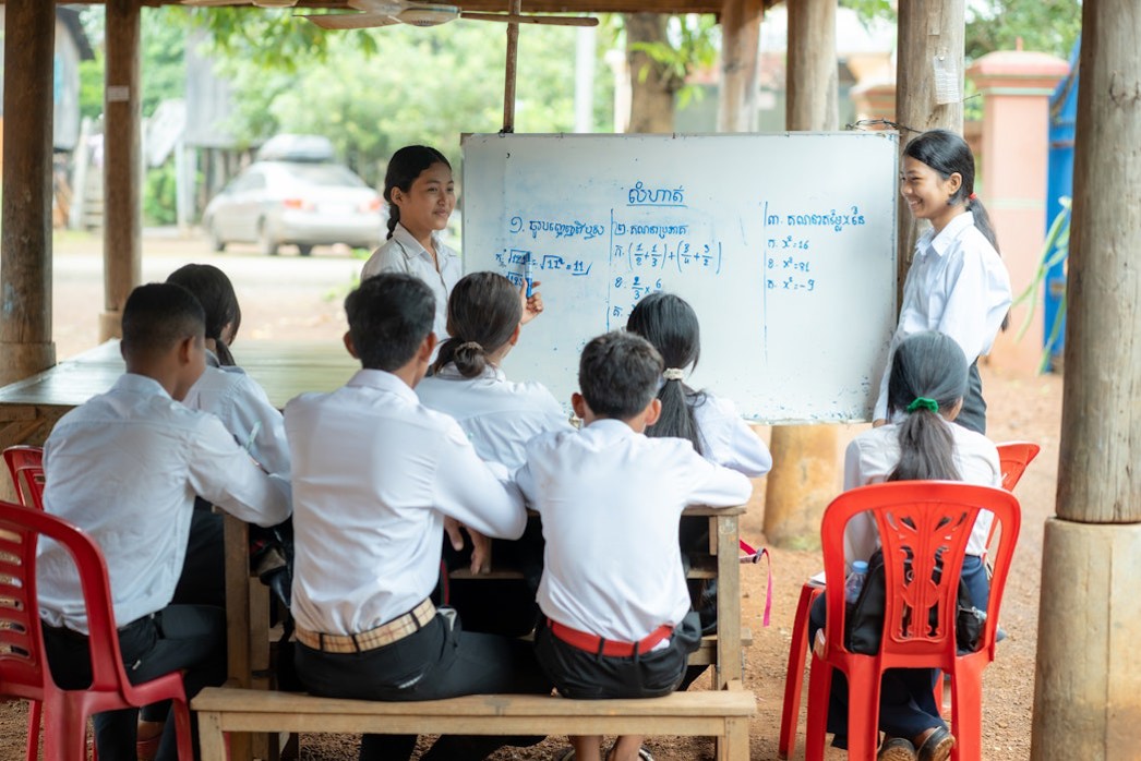 Equity in education, children learning outside in a Room to Read community